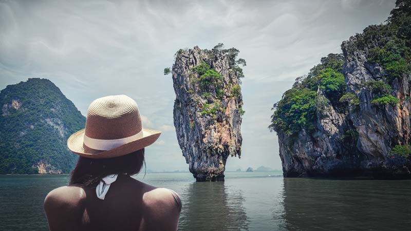 Woman in scenic waters